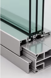  A close-up cross-section of a window frame, showing multiple panes of glass and the internal aluminum profiles.